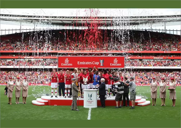 The Arsenal team lift the Emirates Cup Trophy