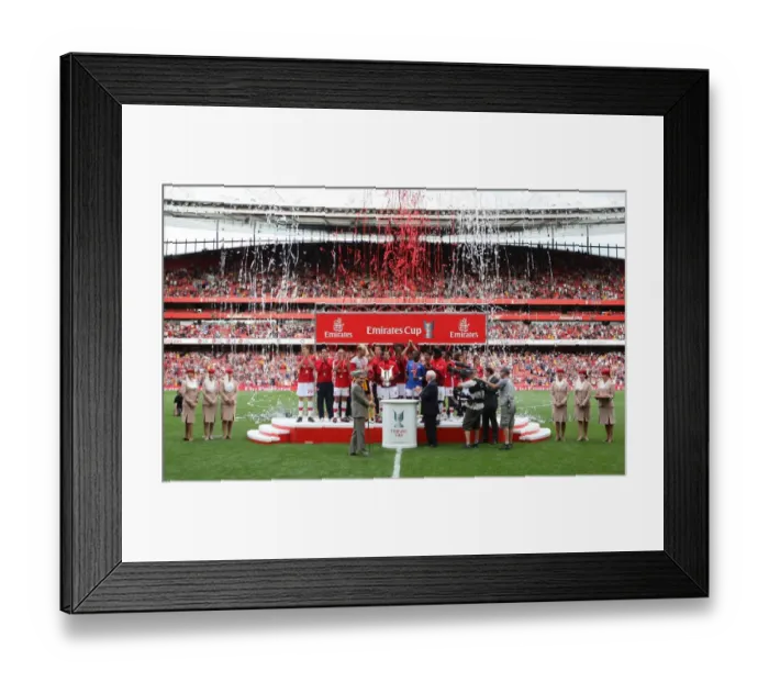 Framed Print : The Arsenal team lift the Emirates Cup Trophy