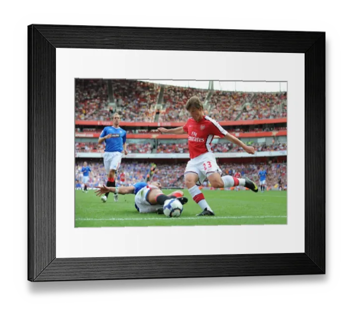 Framed Print : Andrey Arshavin (Arsenal) Madjid Bougherra (Rangers) Framed Print : Andrey Arshavin (Arsenal) Madjid Bougherra (Rangers)