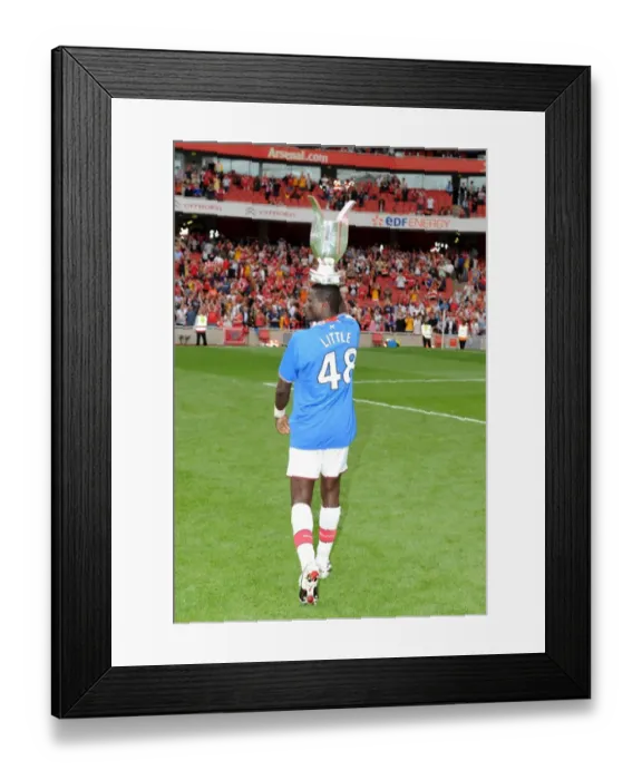 Framed Print : Emmanuel Eboue Celebrating Arsenal's Emirates Cup Victory over Rangers