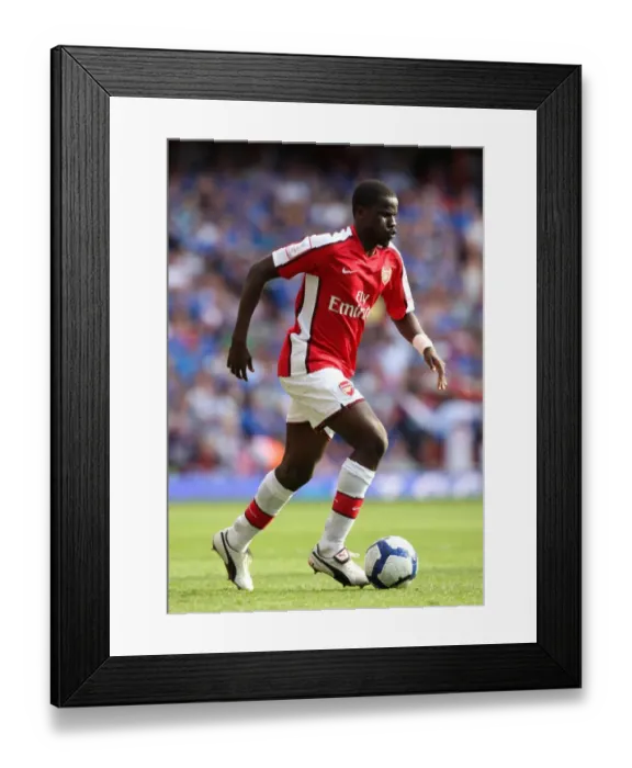 Framed Print : Emmanuel Eboue's Triumph: Arsenal 3-0 Rangers at Emirates Cup, 2009