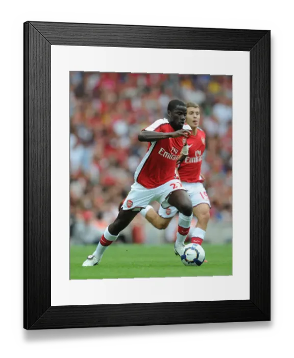 Framed Print : Arsenal's Emmanuel Eboue Celebrates Goal Against Rangers in Emirates Cup Match, 2009