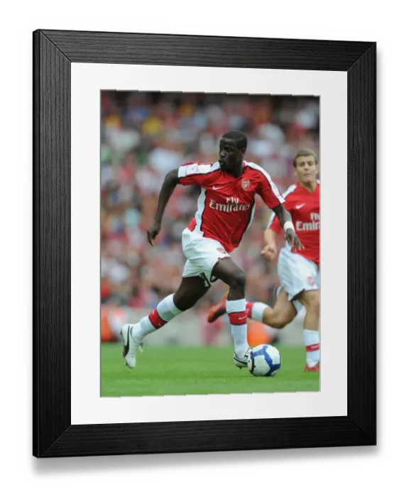Framed Print : Arsenal's Triumph: Eboue Shines in 3-0 Emirates Cup Victory over Rangers, 2009
