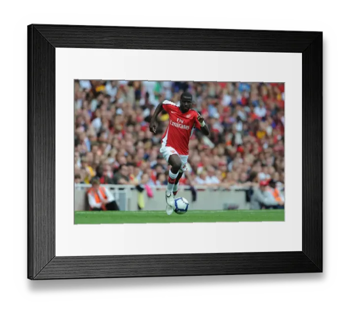 Framed Print : Arsenal's Emmanuel Eboue Scores in 3:0 Victory over Rangers at Emirates Cup Day 2