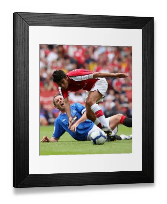 Framed Print : Eduardo (Arsenal) David Weir (Rangers)