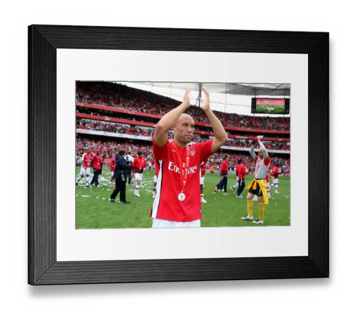 Framed Print : Mikael Silvestre (Arsenal) claps the fans after the match Framed Print : Mikael Silvestre (Arsenal) claps the fans after the match