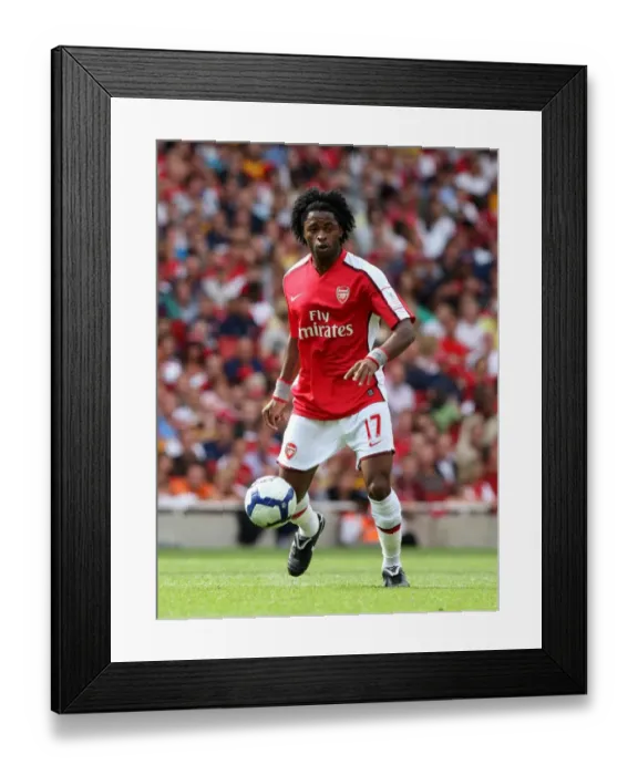 Framed Print : Alex Song's Triumph: Arsenal 3-0 Rangers at Emirates Cup, 2009
