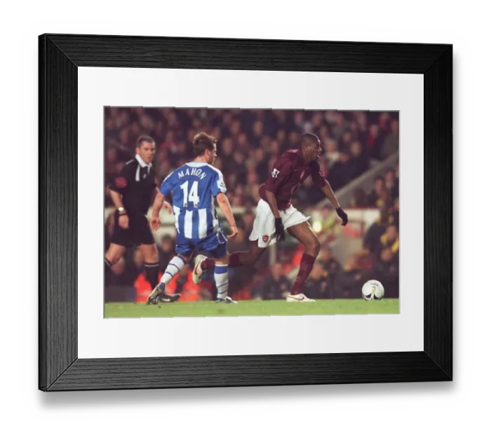 Framed Print : Abou Diaby (Arsenal) Alan Mahon (Wigan). Arsenal 2: 1 Wigan Athletic Framed Print : Abou Diaby (Arsenal) Alan Mahon (Wigan). Arsenal 2: 1 Wigan Athletic