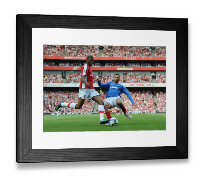 Framed Print : Abou Diaby (Arsenal) Nadir Belhadj (Portsmouth)
