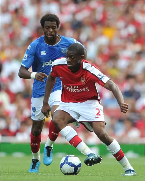 Abou Diaby (Arsenal) Frederic Piquionne (Portsmouth)