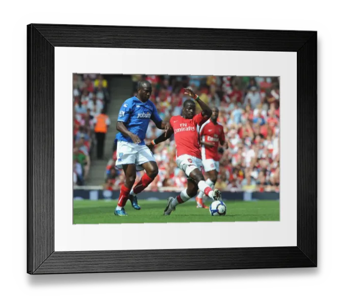 Framed Print : Emmaniuel Eboue (Arsenal) John Utaka (Portsmouth) Framed Print : Emmaniuel Eboue (Arsenal) John Utaka (Portsmouth)