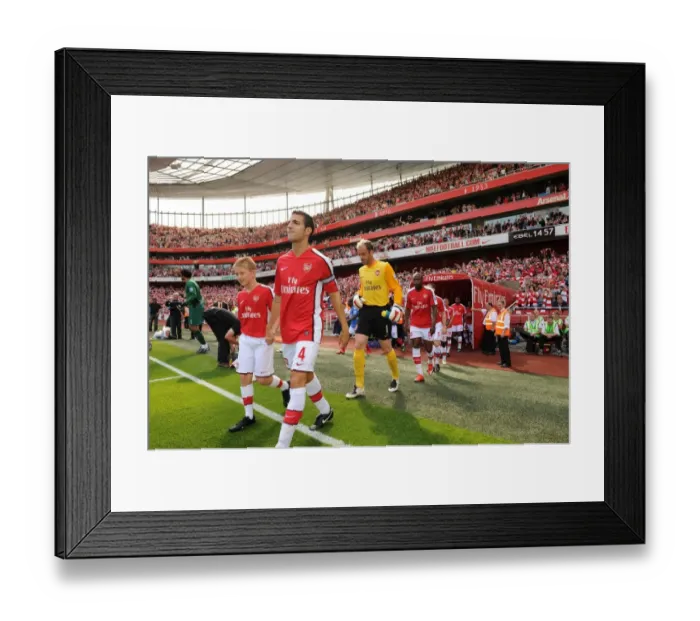 Framed Print : Arsenal captain Cesc Fabregas leads the team out Framed Print : Arsenal captain Cesc Fabregas leads the team out