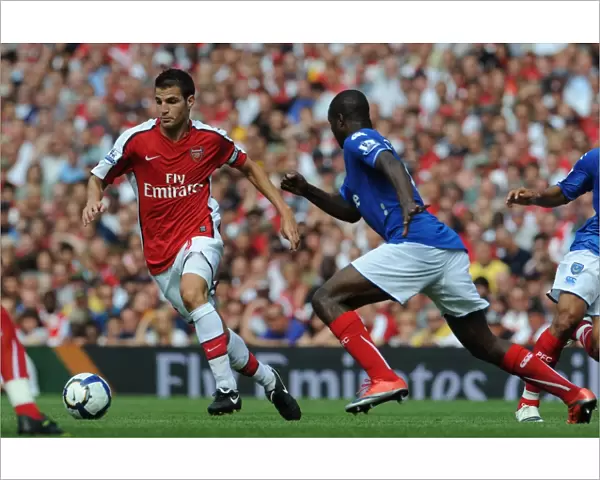 Cesc Fabregas (Arsenal) Aaron Mokoena (Portsmouth)