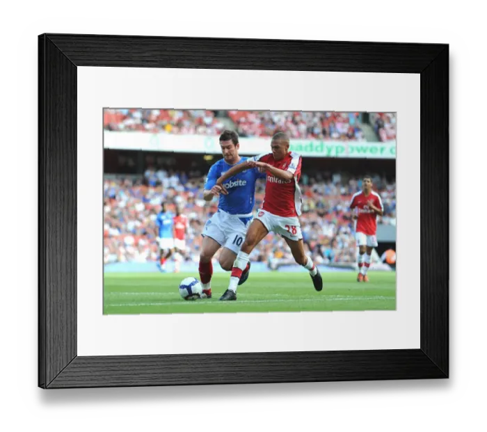 Framed Print : Kieran Gibbs (Arsenal) Kevin Nugent (Portsmouth) Framed Print : Kieran Gibbs (Arsenal) Kevin Nugent (Portsmouth)
