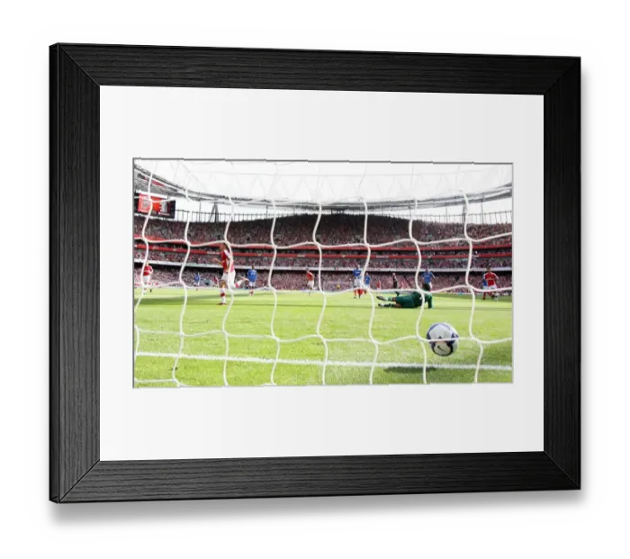 Framed Print : Aaron Ramsey shoots past Portsmouth goalkeeper David