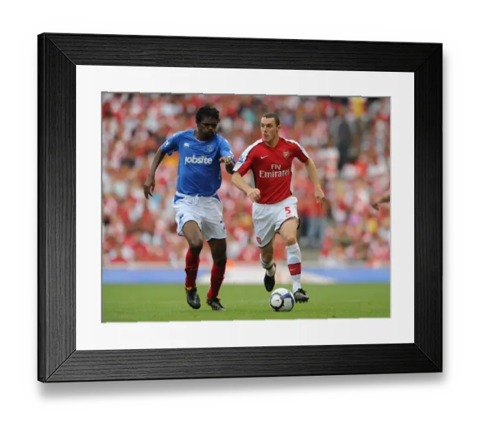 Framed Print : Arsenal's Vermaelen and Kanu: Celebrating Arsenal's 4-1 Victory Over Portsmouth at Emirates Stadium (2009) Framed Print : Arsenal's Vermaelen and Kanu: Celebrating Arsenal's 4-1 Victory Over Portsmouth at Emirates Stadium (2009)