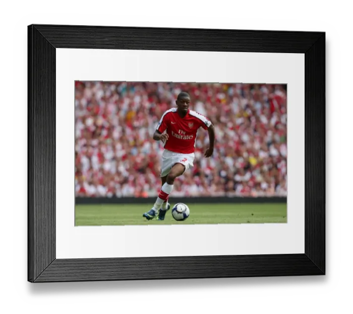 Framed Print : Abou Diaby's Stunner: Arsenal Crush Portsmouth 4-1 in Premier League Opener at Emirates Stadium