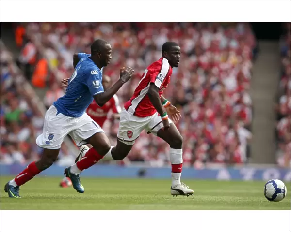 Emmanuel Eboue (Arsenal) John Utaka (Portsmouth)