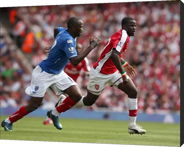 Emmanuel Eboue (Arsenal) John Utaka (Portsmouth)