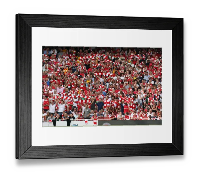 Framed Print : Arsenal Fans Celebrate 4:1 Victory Over Portsmouth in the Barclays Premier League at Emirates Stadium