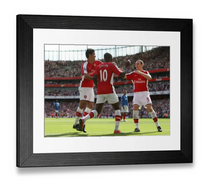 Framed Print : Triumphant Threesome: William Gallas, Eduardo, and Thomas Vermaelen Celebrate Arsenal's 4-1 Victory Over Portsmouth