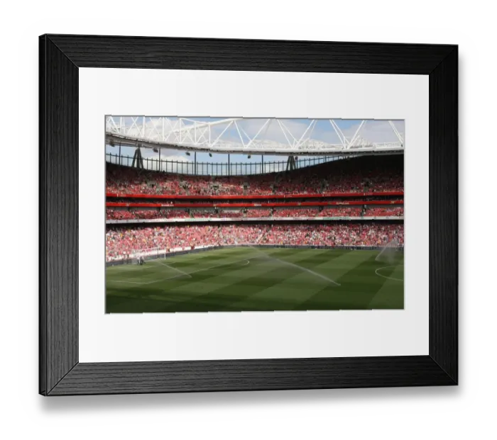 Framed Print : Arsenal's Wet Victory: 4-1 Over Portsmouth in the Premier League (2009)