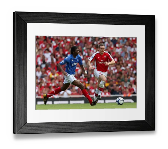 Framed Print : Arsenal's Victory: Vermaelen and Kanu Shine in 4-1 Premier League Win over Portsmouth at Emirates Stadium (August 2009) Framed Print : Arsenal's Victory: Vermaelen and Kanu Shine in 4-1 Premier League Win over Portsmouth at Emirates Stadium (August 2009)