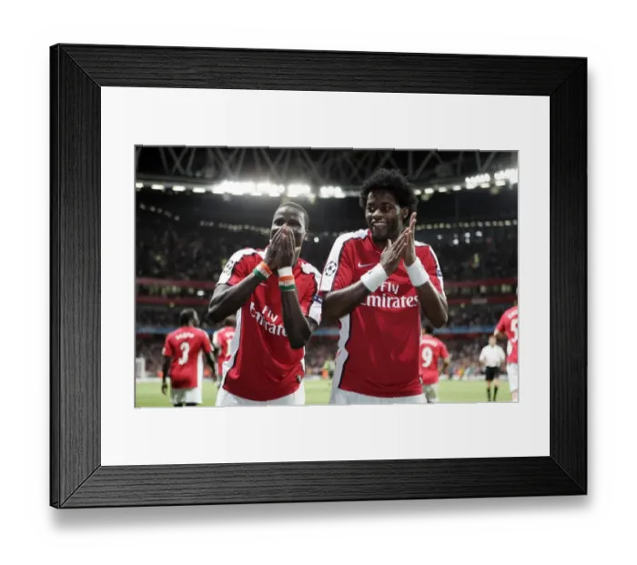 Framed Print : Emmanuel Eboue celebrates scoring Arsenals 2nd goal with Alex Song Framed Print : Emmanuel Eboue celebrates scoring Arsenals 2nd goal with Alex Song
