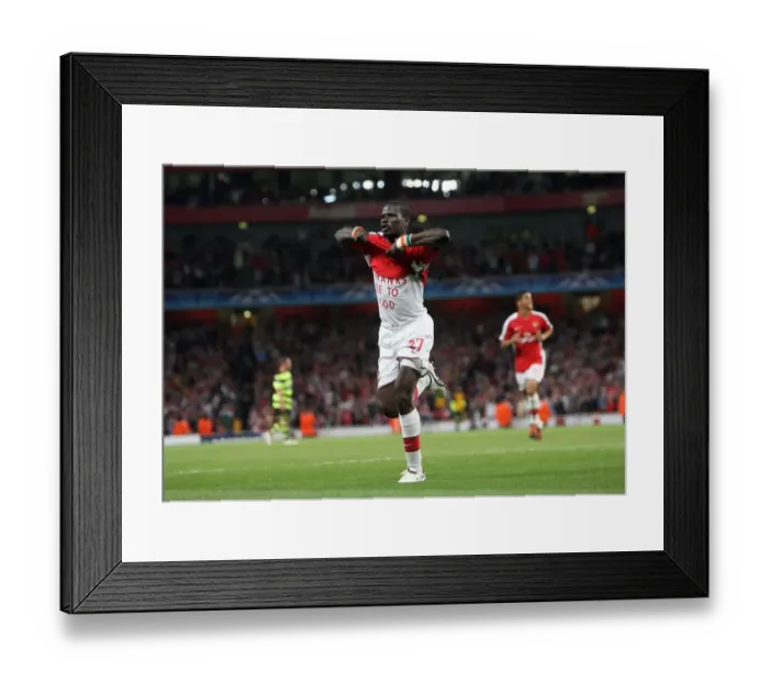 Framed Print : Thrilling Moment: Emmanuel Eboue Scores the Decisive Goal for Arsenal in UEFA Champions League Victory over Celtic Framed Print : Thrilling Moment: Emmanuel Eboue Scores the Decisive Goal for Arsenal in UEFA Champions League Victory over Celtic
