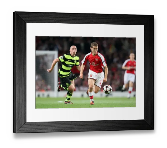 Framed Print : Arsenal's Jack Wilshere and Scott Brown Clash in Exciting 3:1 UEFA Champions League Victory over Celtic