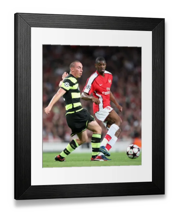 Framed Print : Abou Diaby and Scott Brown Clash in Intense Arsenal vs. Celtic UEFA Champions League Showdown: Arsenal Secures 3-1 Victory Framed Print : Abou Diaby and Scott Brown Clash in Intense Arsenal vs. Celtic UEFA Champions League Showdown: Arsenal Secures 3-1 Victory