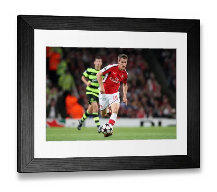 Framed Print : Aaron Ramsey's Stunner: Arsenal's 3-1 Victory Over Celtic in the UEFA Champions League Qualifier (2009)