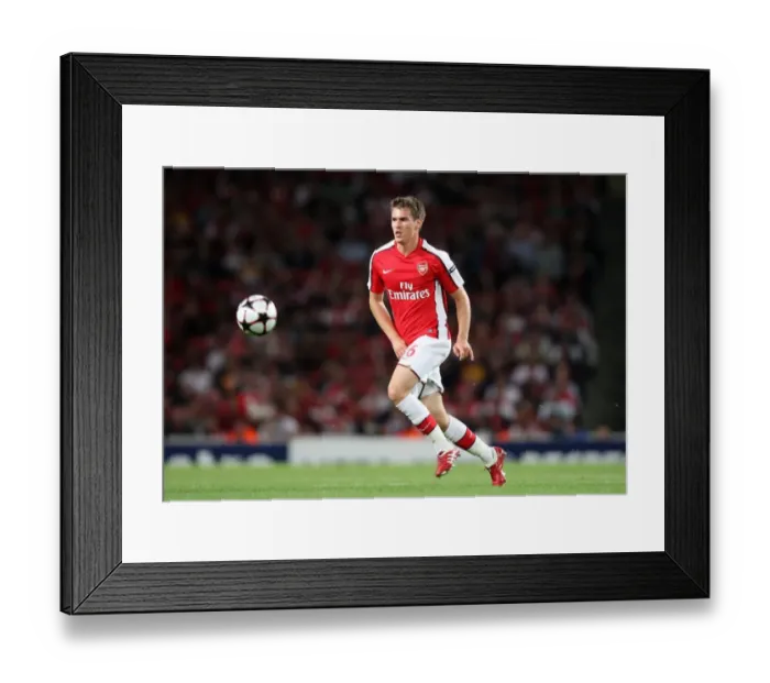 Framed Print : Arsenal's Aaron Ramsey Scores Stunner: 3-1 Victory Over Celtic in UEFA Champions League Qualifier (2009) Framed Print : Arsenal's Aaron Ramsey Scores Stunner: 3-1 Victory Over Celtic in UEFA Champions League Qualifier (2009)