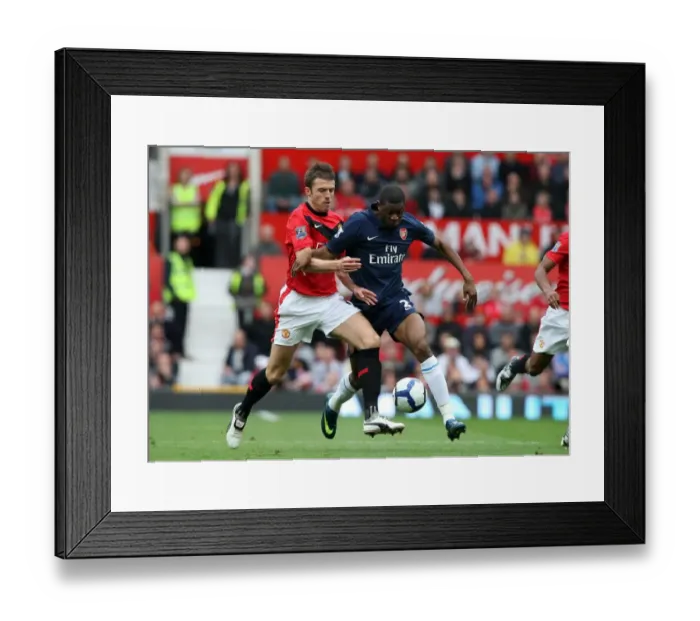 Framed Print : Manchester United Edge Past Arsenal: A Tight Battle Between Abou Diaby and Michael Carrick