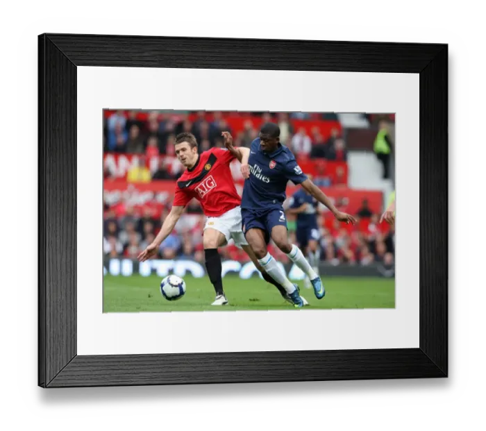 Framed Print : Diaby vs. Carrick: A Battle at Old Trafford - Manchester United Edge Past Arsenal 2:1 in Premier League Framed Print : Diaby vs. Carrick: A Battle at Old Trafford - Manchester United Edge Past Arsenal 2:1 in Premier League