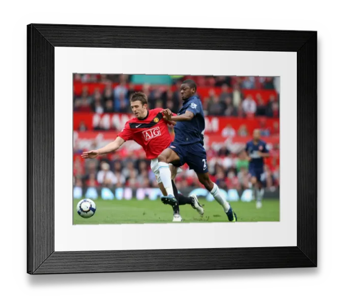 Framed Print : Tense Battle: Abou Diaby vs. Michael Carrick - Manchester United's 2-1 Victory over Arsenal in the Premier League Framed Print : Tense Battle: Abou Diaby vs. Michael Carrick - Manchester United's 2-1 Victory over Arsenal in the Premier League