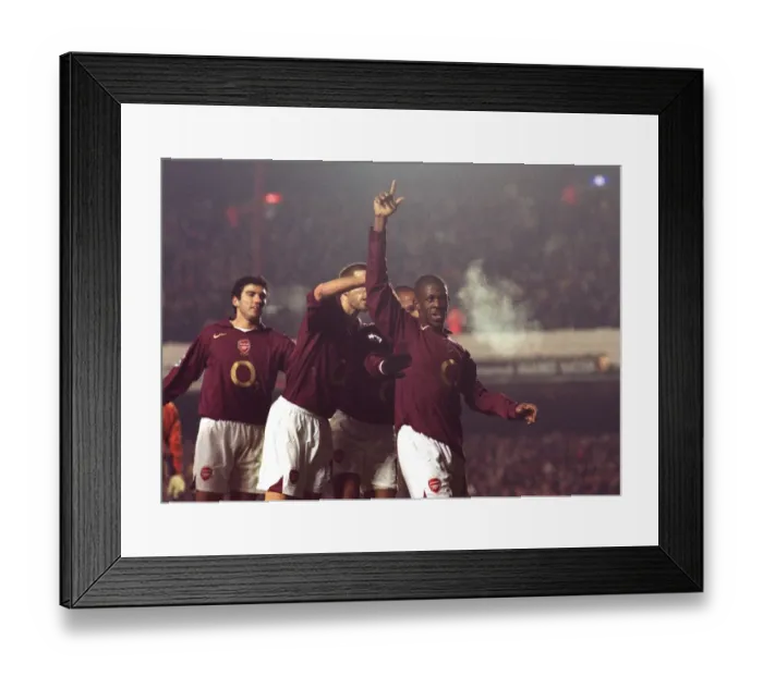 Framed Print : Kerrea Gilbert (Arsenal) is mobbed by his team mates for setting up the 1st Arsenal Goal Framed Print : Kerrea Gilbert (Arsenal) is mobbed by his team mates for setting up the 1st Arsenal Goal