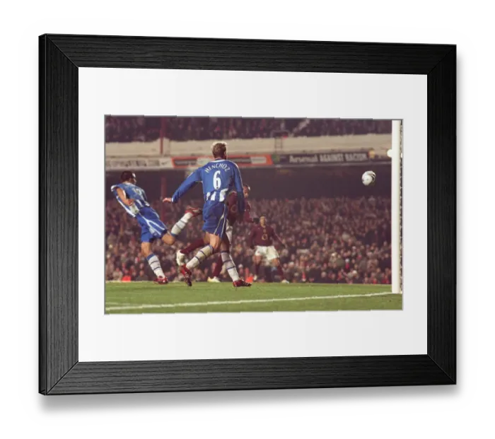 Framed Print : Thierry Henry scores Arsenals 1st goal. Arsenal 2: 1 Wigan Athletic Framed Print : Thierry Henry scores Arsenals 1st goal. Arsenal 2: 1 Wigan Athletic