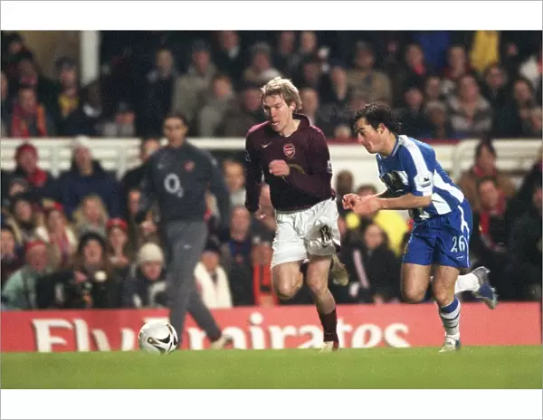 Hleb vs Baines: A Tight Carling Cup Semifinal Battle at Highbury - Wigan's Upset Win