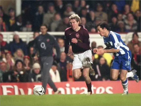 Hleb vs Baines: A Tight Carling Cup Semifinal Battle at Highbury - Wigan's Upset Win