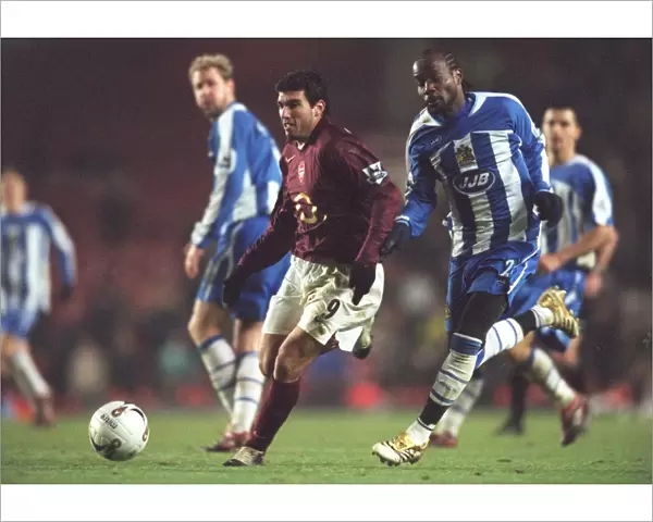 Jose Reyes (Arsenal) Pascal Chimbonda (Wigan). Arsenal 2: 1 Wigan Athletic