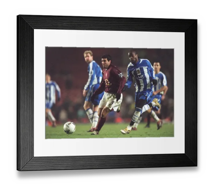Framed Print : Jose Reyes (Arsenal) Pascal Chimbonda (Wigan). Arsenal 2: 1 Wigan Athletic