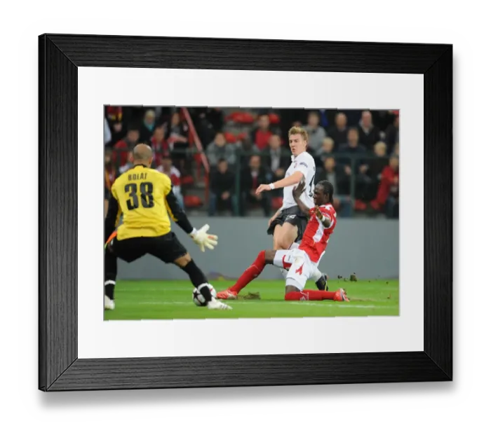 Framed Print : Bendtner's Debut Goal: Arsenal Edges Past Standard Liege 3-2 in Champions League Framed Print : Bendtner's Debut Goal: Arsenal Edges Past Standard Liege 3-2 in Champions League