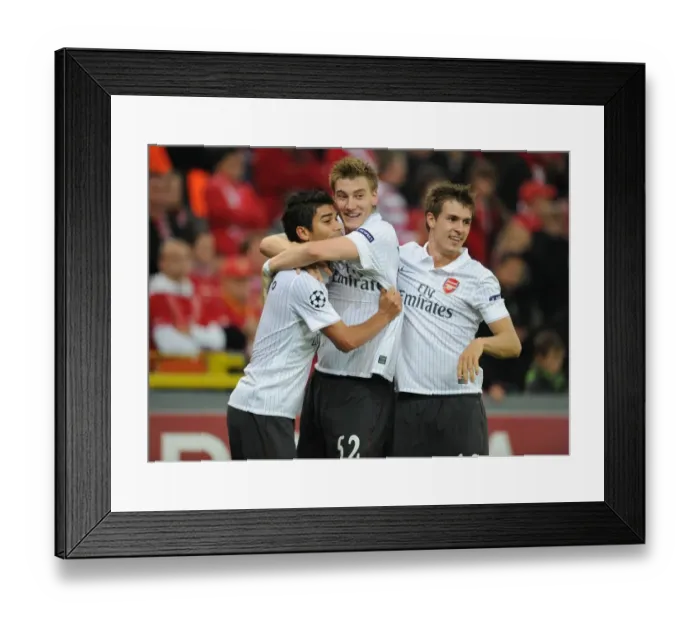 Framed Print : Arsenal's Triumph: Eduardo, Bendtner, and Ramsey Celebrate 3rd Goal vs Standard Liege (16 / 9 / 2009) Framed Print : Arsenal's Triumph: Eduardo, Bendtner, and Ramsey Celebrate 3rd Goal vs Standard Liege (16 / 9 / 2009)