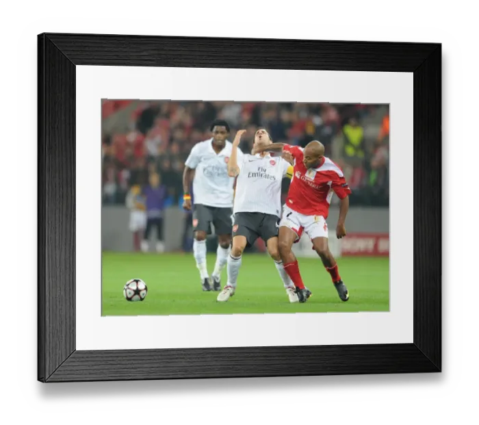 Framed Print : Cesc Fabregas (Arsenal) Wilfried Dalmat (Standard Liege) Framed Print : Cesc Fabregas (Arsenal) Wilfried Dalmat (Standard Liege)