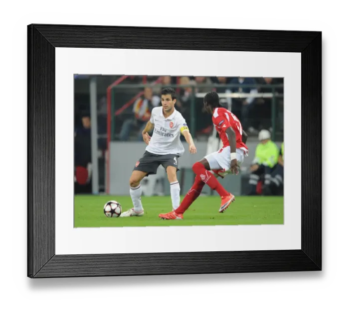 Framed Print : Cesc Fabregas (Arsenal) Eliaquim Mangala (Standard Liege) Framed Print : Cesc Fabregas (Arsenal) Eliaquim Mangala (Standard Liege)