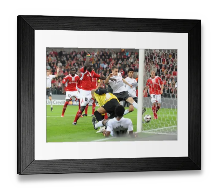 Framed Print : Thomas Vermaelen shoots past Liege goalkeeper Sinan Framed Print : Thomas Vermaelen shoots past Liege goalkeeper Sinan