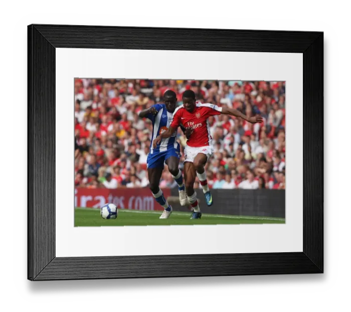 Framed Print : Arsenal's Double Diaby Strike: 4-0 Victory Over Wigan Athletic in the Premier League