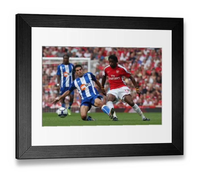 Framed Print : Arsenal's Double Victory: 4-0 Over Wigan Athletic Featuring Alex Song vs. Jordi Gamez, Emirates Stadium, September 19, 2009 Framed Print : Arsenal's Double Victory: 4-0 Over Wigan Athletic Featuring Alex Song vs. Jordi Gamez, Emirates Stadium, September 19, 2009