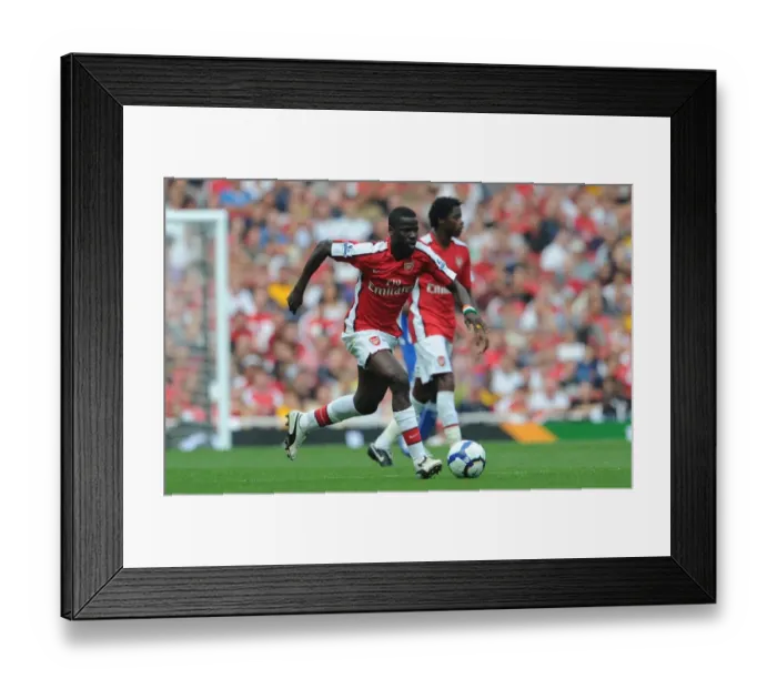 Framed Print : Arsenal's Emmanuel Eboue Scores in 4-0 Win over Wigan Athletic, Barclays Premier League, 2009 Framed Print : Arsenal's Emmanuel Eboue Scores in 4-0 Win over Wigan Athletic, Barclays Premier League, 2009